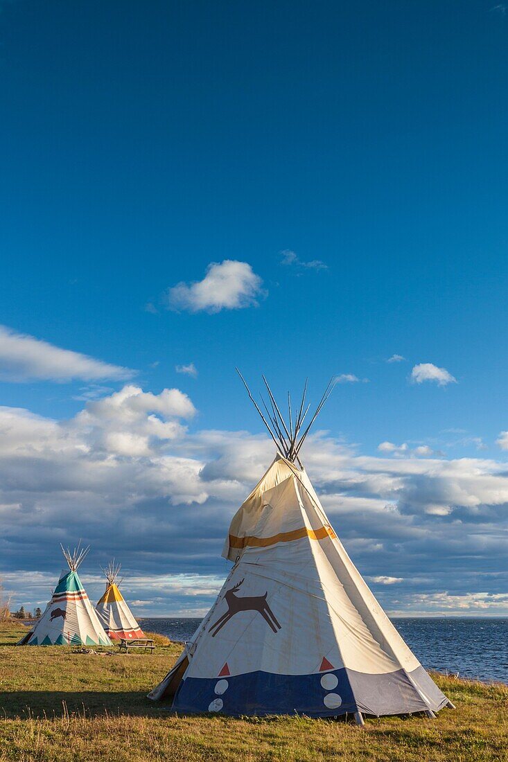 Canada, Quebec, Gaspe Peninsula, Gesgapegiag, Mic-Mac First Nations tee-pees by the Baie des Chaleurs.