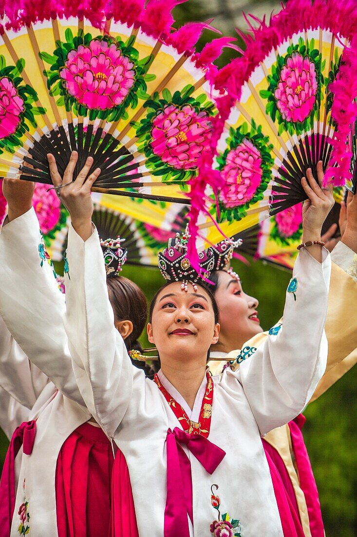 Traditional folk dancers with fans at Korean Festival, Getty Center, Los Angeles CA.