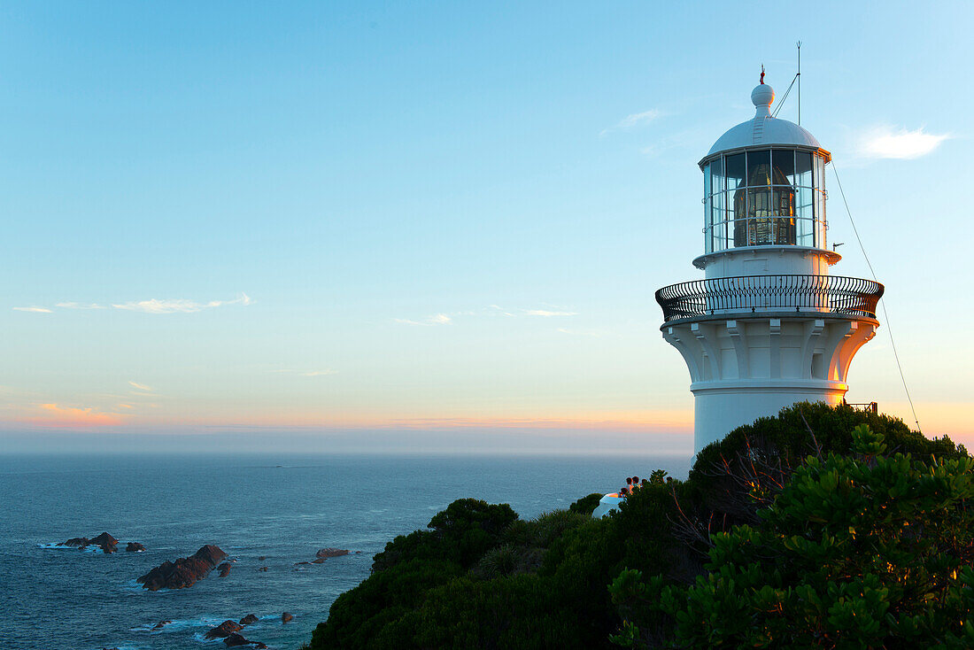 The picturesque Sugarloaf Point Lighthouse sits high on the headlands of Seal Rocks