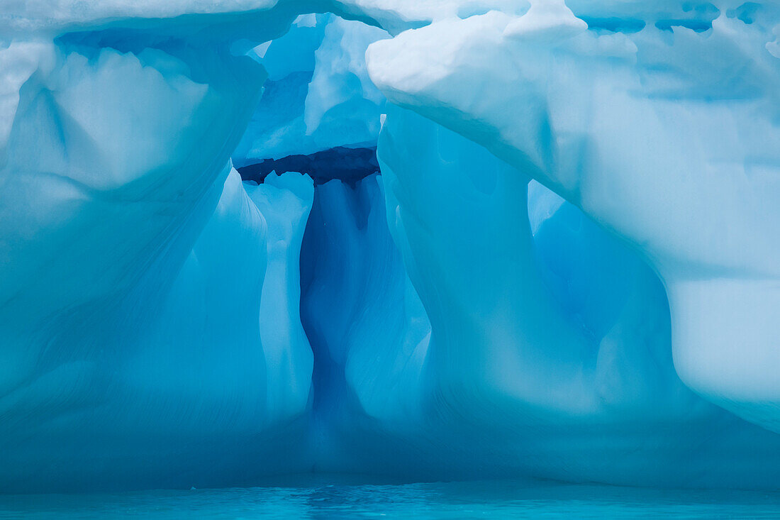 Shades of blue from extremely light to deep and dark are seen in this detail of a sculptural iceberg, Paradise Bay (Paradise Harbor), Danco Coast, Graham Land, Antarctica