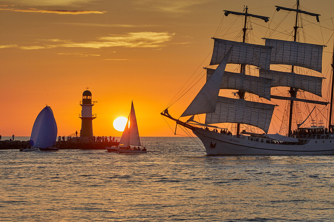 Traditional sailer on the pier light in Warnemuende Rostock Hanse Sail, Mecklenburg-Western Pomerania Germany's Baltic Coast