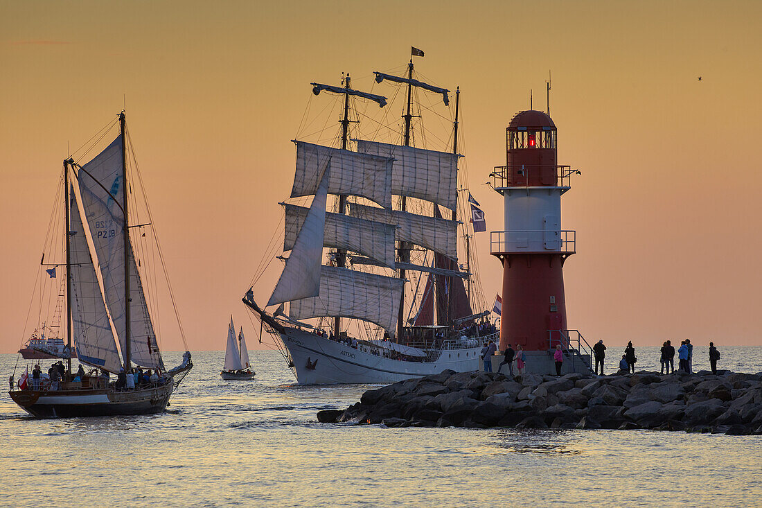 Traditional sailer on the pier light in Warnemuende Rostock Hanse Sail, Mecklenburg-Western Pomerania Germany's Baltic Coast