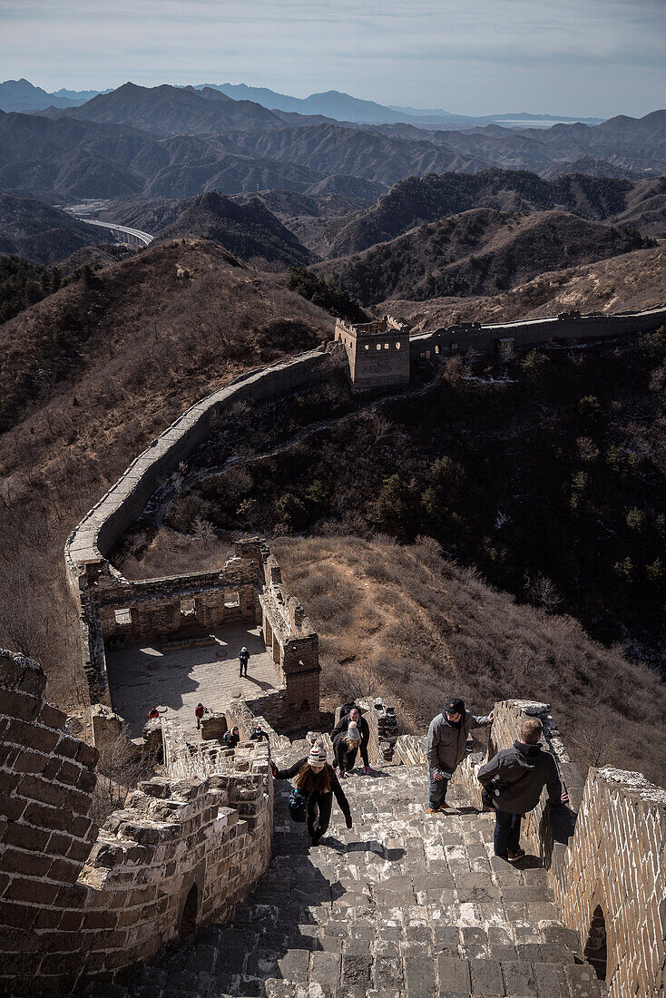 tourists scramble up the steep stairs at Great Wall of China, Jinshanling section, Luanping, China, Asia