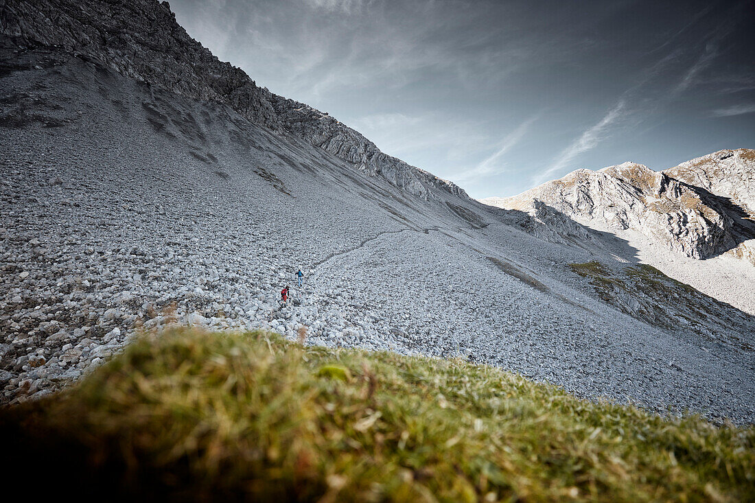 Two Hikers on the way to the top of Daniel Mountain, Daniel mountain, Ammergau Alps, Tyrol, Austria