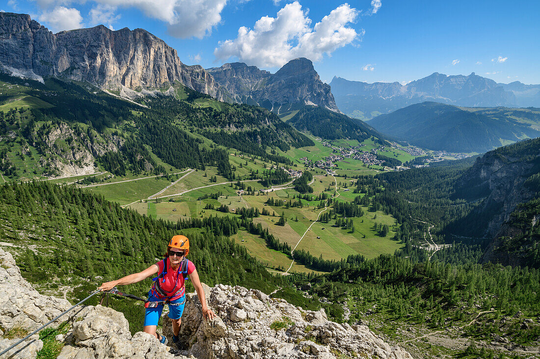 Woman climbing fixed-rope route Pisciadu, fixed-rope route Pisciadu, Sella range, Dolomites, UNESCO World Heritage Site Dolomites, South Tyrol, Italy