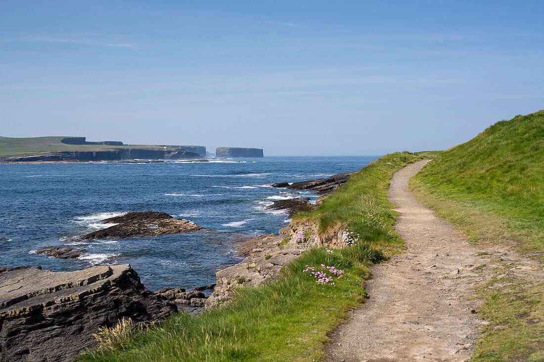 Trail to Georges Head along the Cliffs of Kilkee overlooking the coastline, Byrnes Cove, Kilkee, County Clare, Ireland, Europe