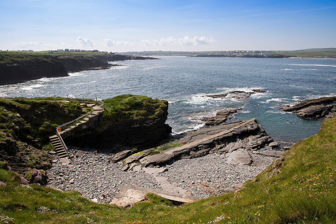 Hike to Georges Head on the Cliffs of Kilkee overlooking the coast of Kilkee with swimming opportunity, Byrnes Cove, Kilkee, County Clare, Ireland, Europe