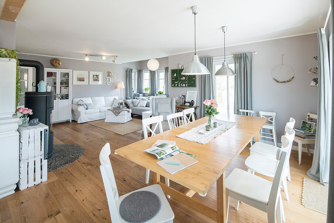 Modern Nordic Living room in family house with white and gray furniture and wooden floor, Korbach, Hesse, Germany, Europe