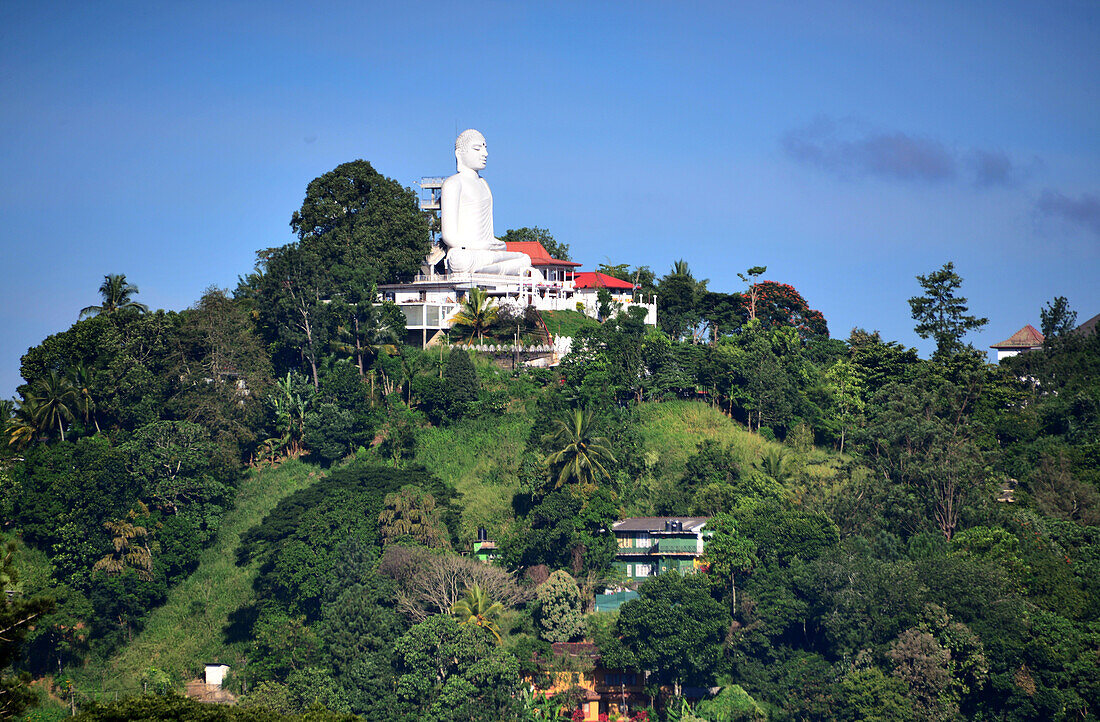 Buddha figure over Kandy in the mountains, Sri Lanka