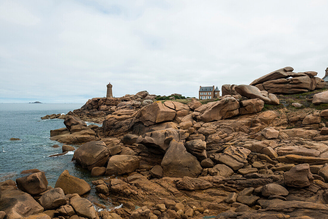 Maison Gustave Eiffel with lighthouse and granite rocks, Phare de Ploumanac'h or Phare de Mean Ruz, Ploumanach, Côte de Granit Rose, Côtes d’Armor,  Brittany, France