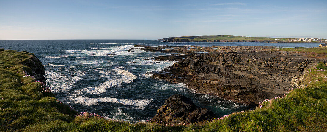 The Cliff Walk in Kilkee stretches from the bay to the north and south along the coast and shows the rough beauty of the landscape, Kilkee, County Clare, Ireland, Europe