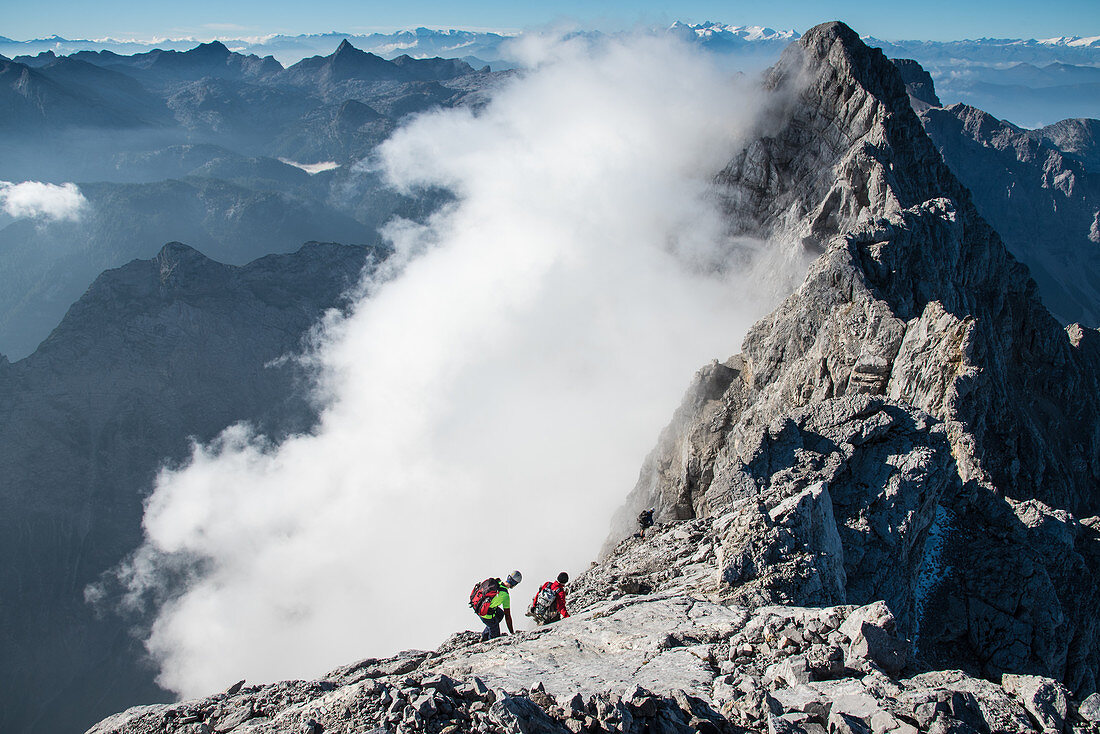 Climber on the Watzmanngrat, view to the southern tip of the Watzmann, Berchtesgaden Alps, Berchtesgaden, Germany
