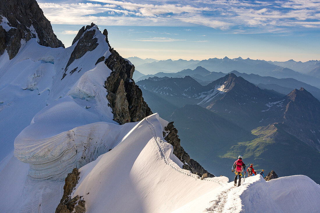 Climbers in crossing the Rochefortgrat, Aguille de Rochefort, Grandes Jorasses, Mont Blanc group, France