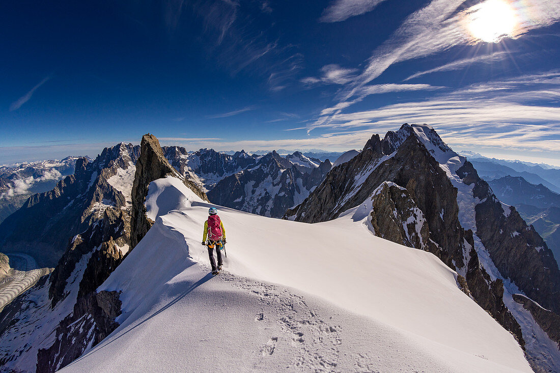 Climbers on the Dome de Rochefort, path to the Grandes Jorasses, Mont Blanc group, France