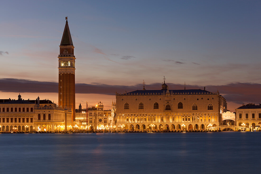 St. Mark’s Campanile and Doge’s Palace from San Giorgio Maggiore Island at dusk, Venice, Veneto, Italy