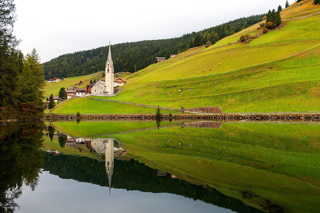 Church of San Nicolò reflected in Lake Valdurna