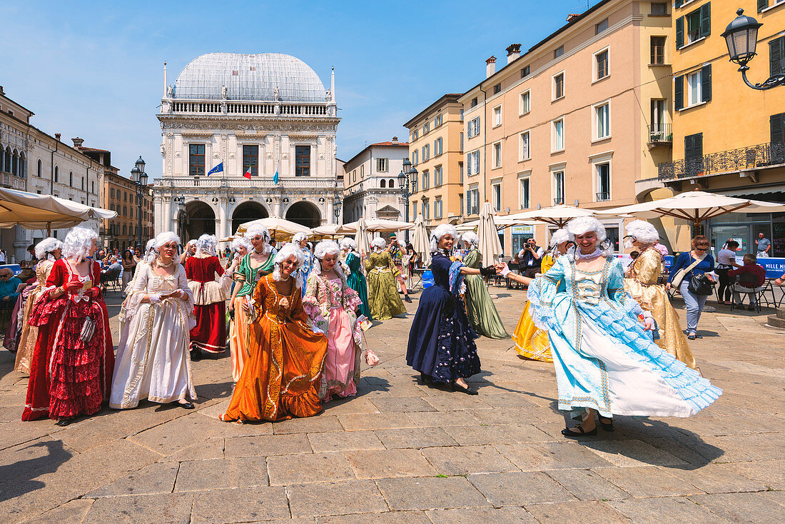 Bridesmaids in piazza loggia, Brescia province, Lombardy District, italy, Europe