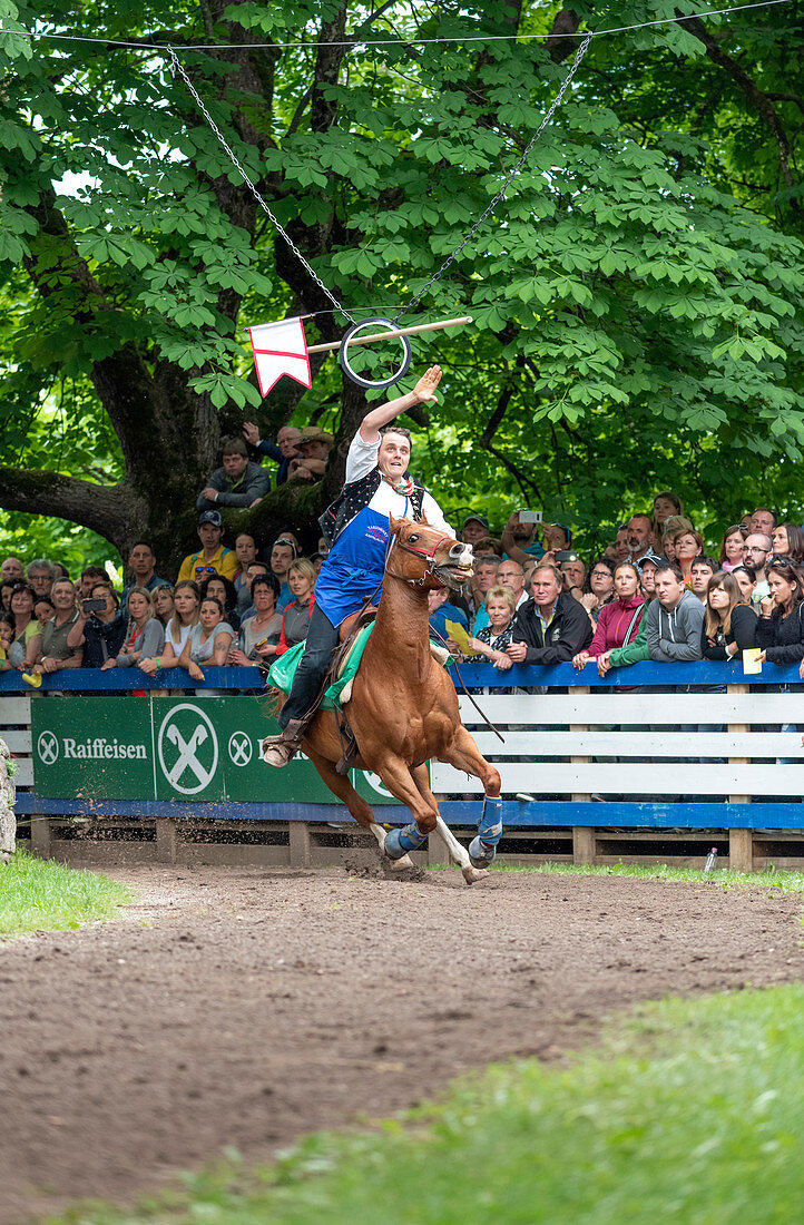 Castelrotto / Kastelruth, South Tyrol, Italy. The traditional ring jousting at the Mount Calvario in Castelrotto