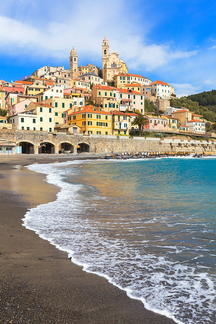 Waves break on the beach of Cervo village. Cervo, Imperia province, Liguria, Italy, Europe.