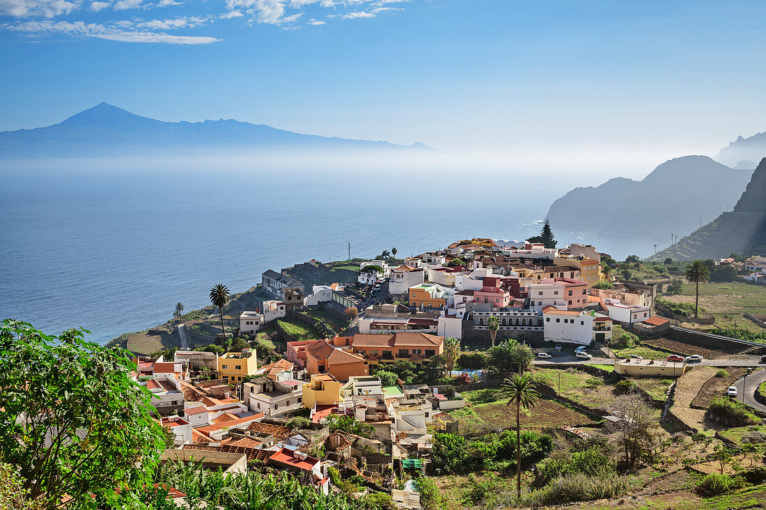 Village of Agulo with view towards Teneriffa with Teide in background, UNESCO World Heritage Teide, from Agulo, La Gomera, Canary Islands, Canaries, Spain