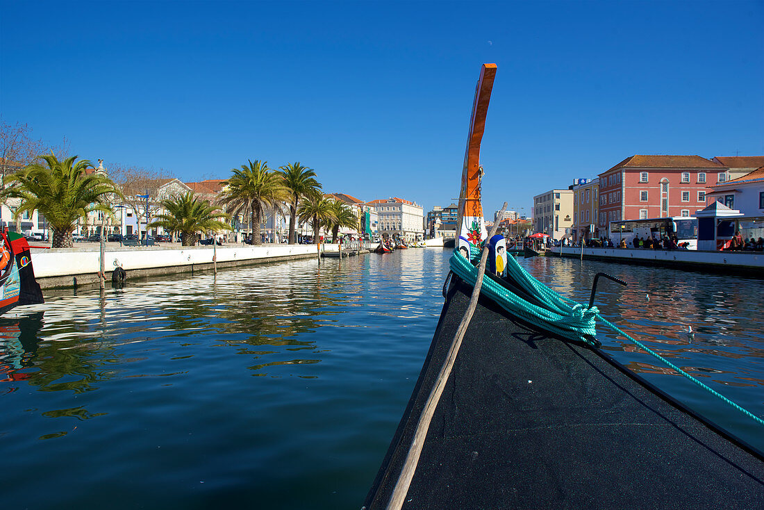 With a boat on the canal in Aveiro, Beira Litoral, Portugal,