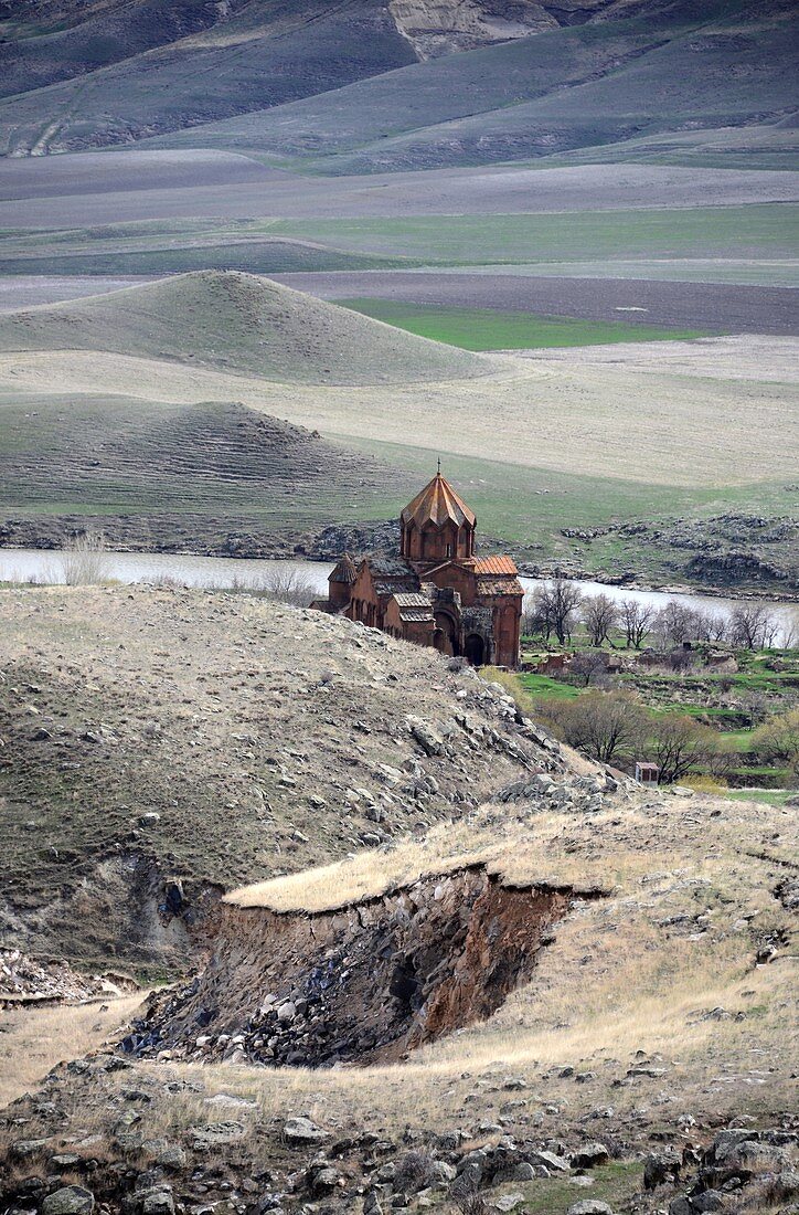 Located in the middle of the barren landscape by the river, Marmaschen Monastery near Gyumri, northern Armenia, Asia