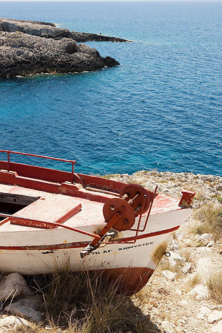 Old fishing boat on the cliffs in the bay of Porto Limnionas, Zakynthos, Ionian Islands, Greece