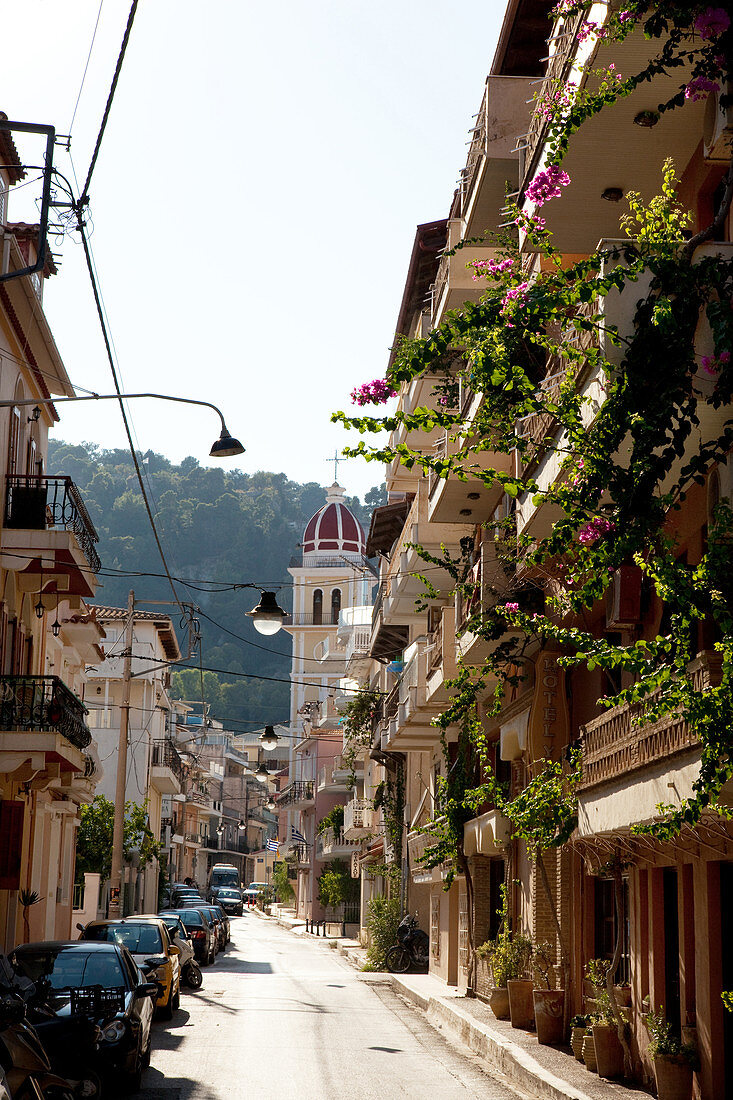 Alley with bougainvillea and church in Zante, Zakynthos city, Zakynthos, Ionian Islands, Greece