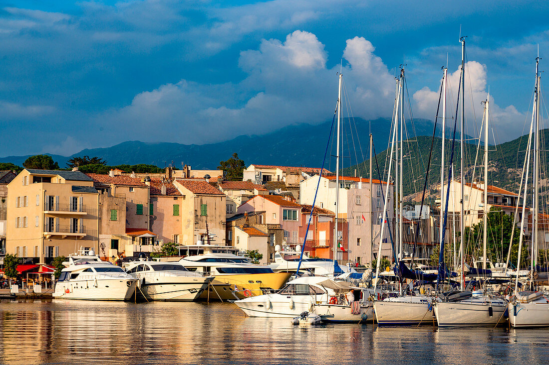 Boats moored in the small harbour of Saint Florent in northern Corsica, France, Mediterranean, Europe