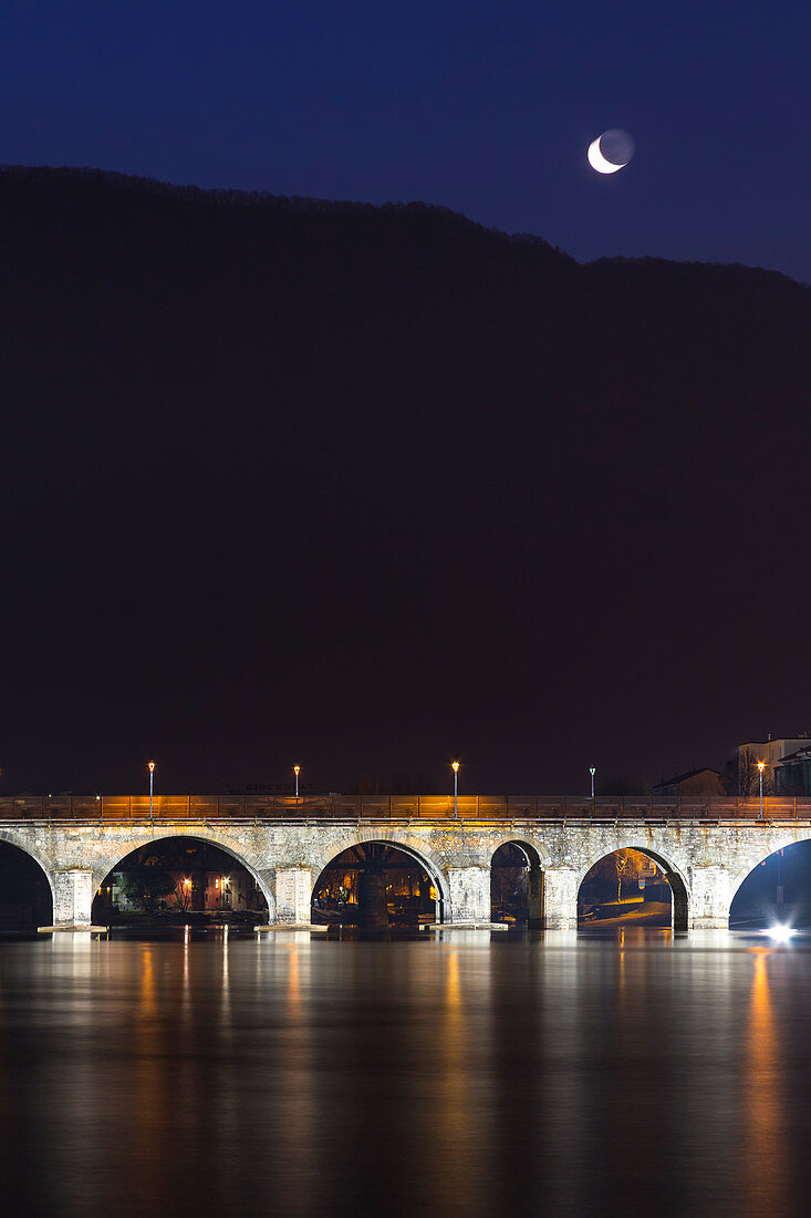 Azzone visconti bridge illuminate in the night, Lecco, Lombardy, Italy, Europe