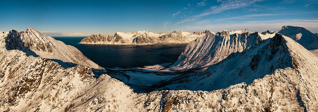 panoramic aerial view taken by drone of the Ersfjord, whit Devil's teeth mountain, Ersfjorden, Senja, Northern Norway, Europe.