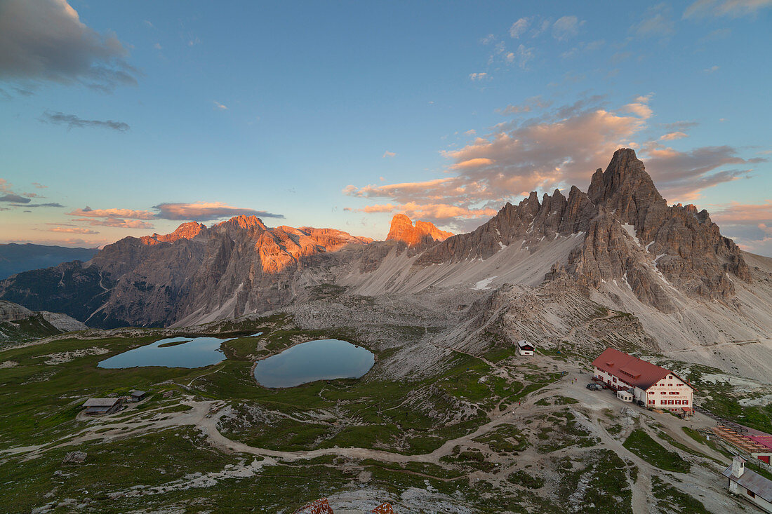 Sunset on Paterno Mount and Piani Lakes with Locatelli-Innerkofler refuge, Dolomites, Dobbiaco, South Tyrol, Bolzano, Italy