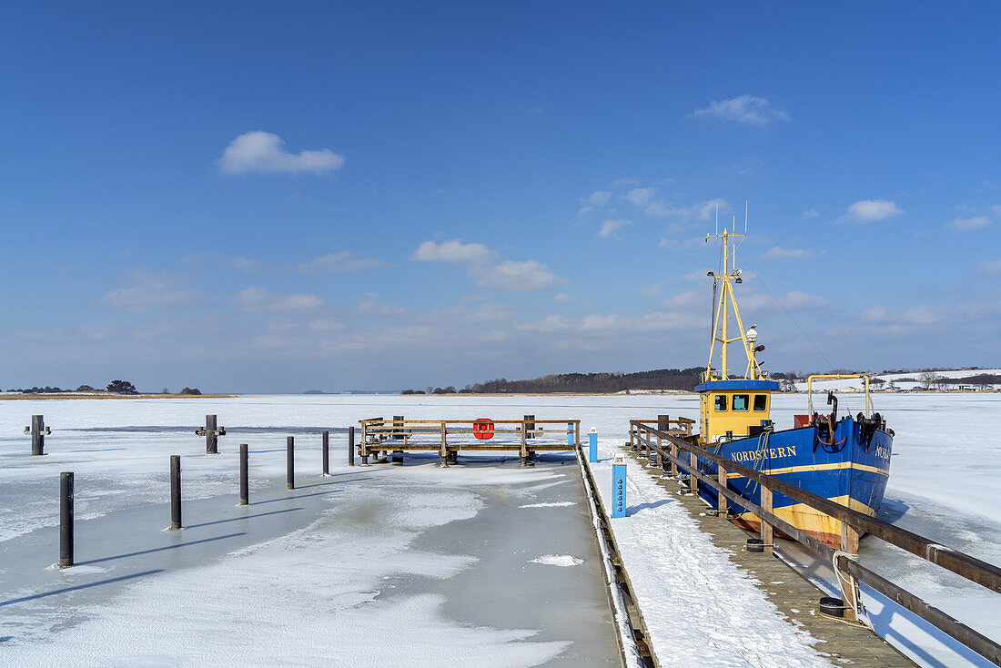 Frosty backwaters with fishing cutter Nordstern at Neppermin, Usedom Island, Baltic Sea coast, Mecklenburg-Vorpommern, Northern Germany