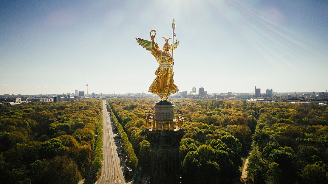 Drone point of view Victory Column and sunny Tiergarten Park, Berlin, Germany