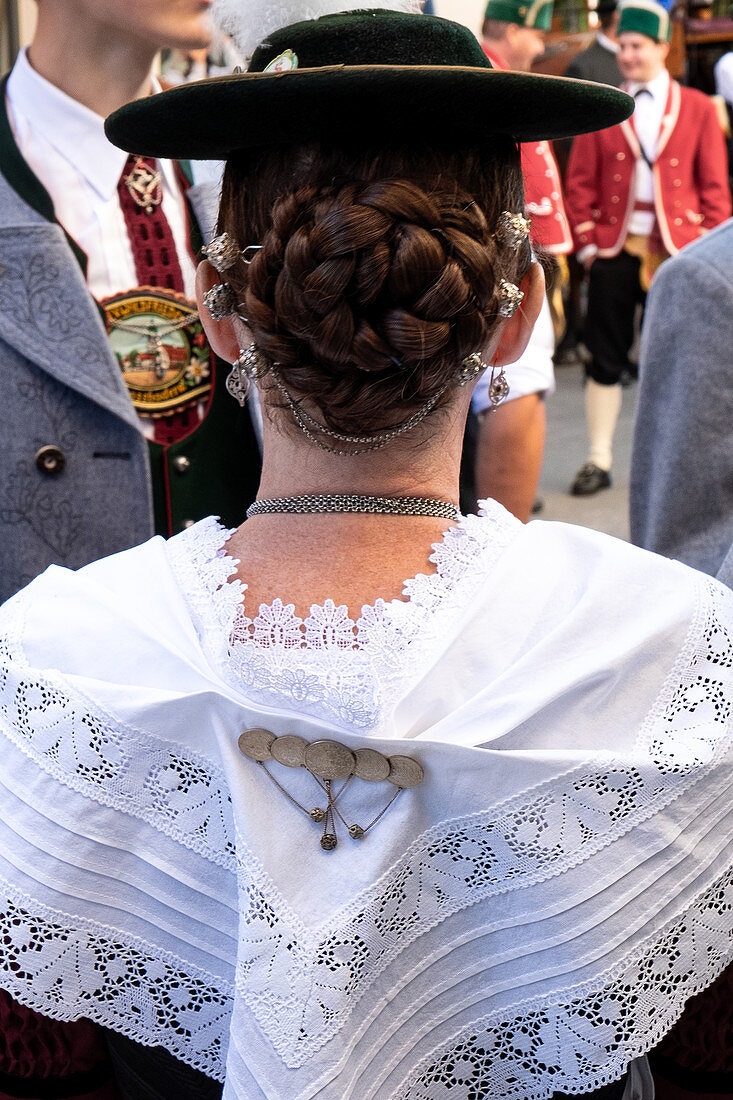 Lady in Bavarian costume from behind, to the entry of the Oktoberfest farmers, Oktoberfest, Munich, Bavaria, Germany