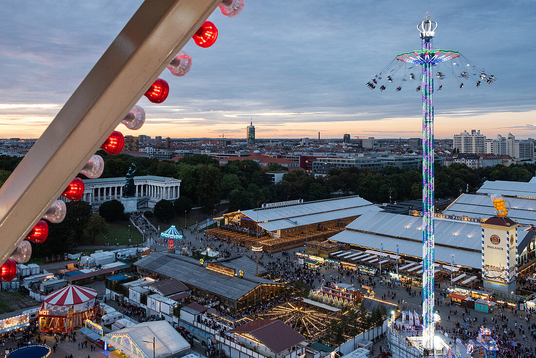View from the ferris wheel to the Oktoberfest in Munich at sunset, Bavaria, Germany