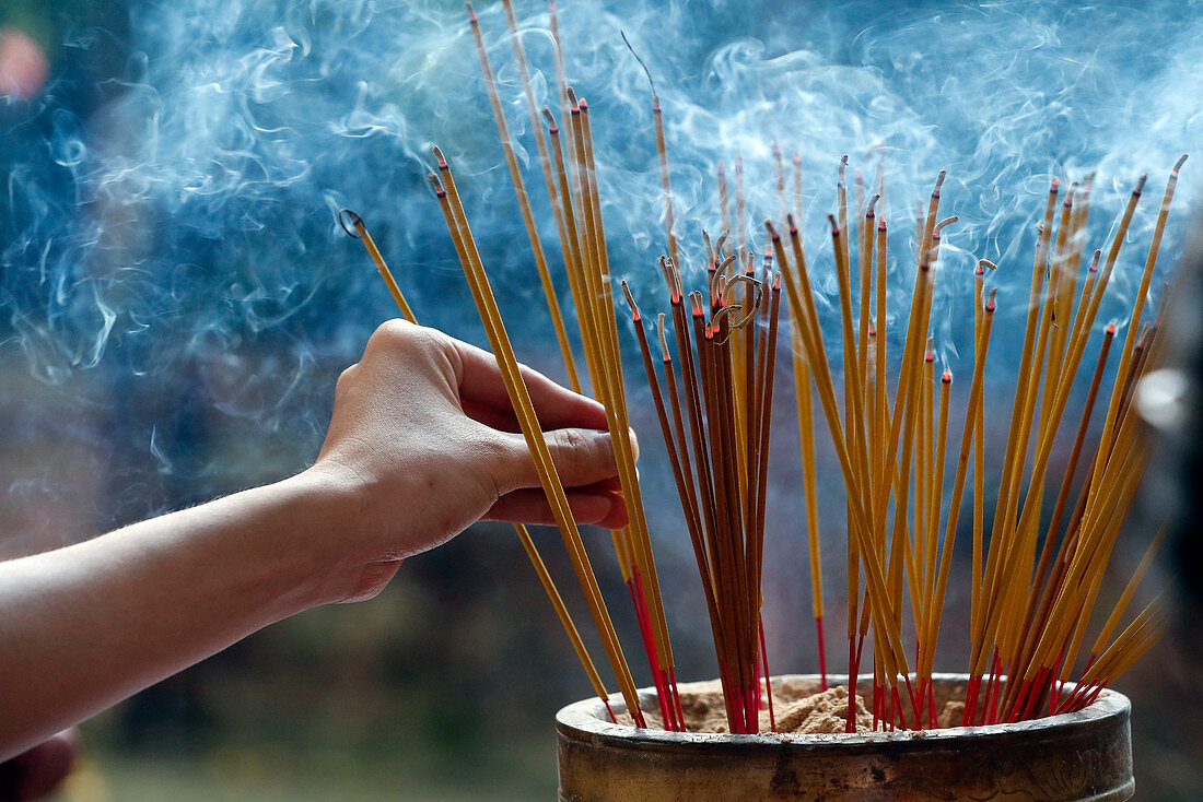 Emperor Jade pagoda (Chua Phuoc Hai), incense sticks on joss stick pot burning, smoke used to pay respect to the Buddha, Ho Chi Minh City, Vietnam, Indochina, Southeast Asia, Asia