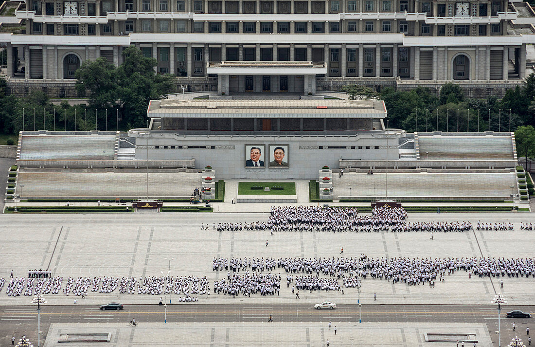 Kim Il Sung Square, hordes of young people rehearsing marching routines prior to a grand parade, Pyongyang, North Korea, Asia