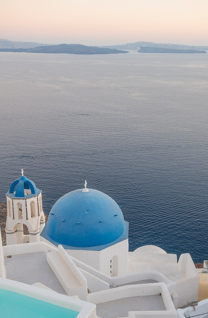 Oia at sunset in Santorini, Cyclades, Aegean Islands, Greek Islands, Greece, Europe