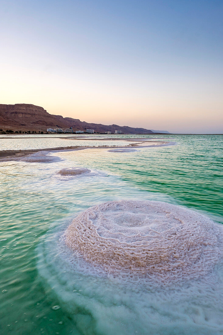Salt deposits in the Dead Sea at sunset, Ein Bokek, Southern District, Israel