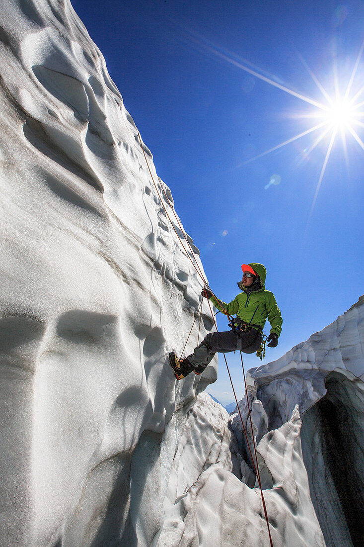 Ice climber climbing glacier at Mount Shuksan, North Cascades National Park, Washington State, USA
