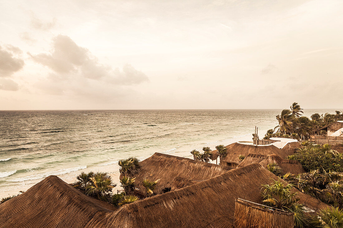 Rooftops and shoreline at Tulum, Mexico