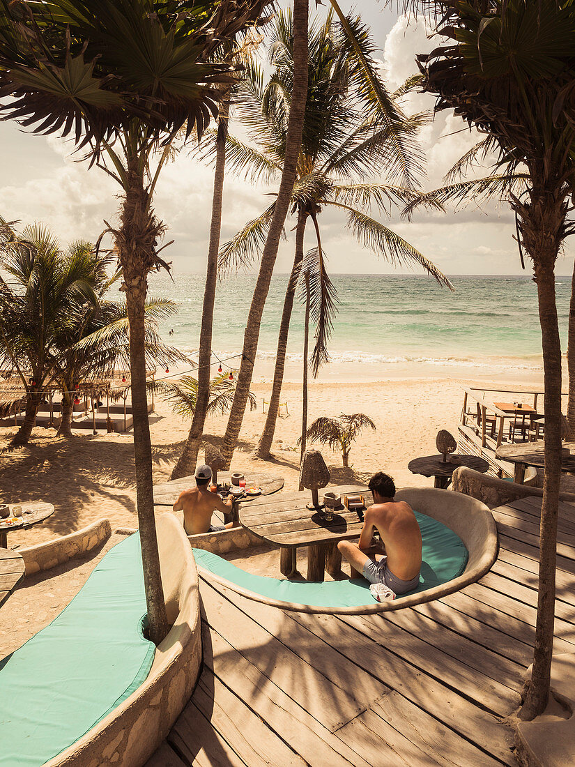 People enjoying beach at Papaya Playa Resort, Tulum, Mexico