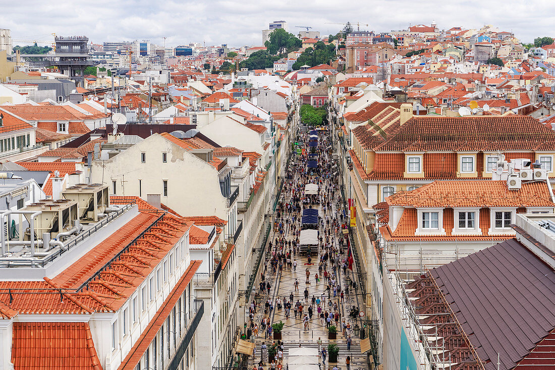 Rua Augusta seen from Arco viewpoint and pedestrian zone with traditional buildings and Santa Justa Lift to the left, Lisbon, Portugal, Europe