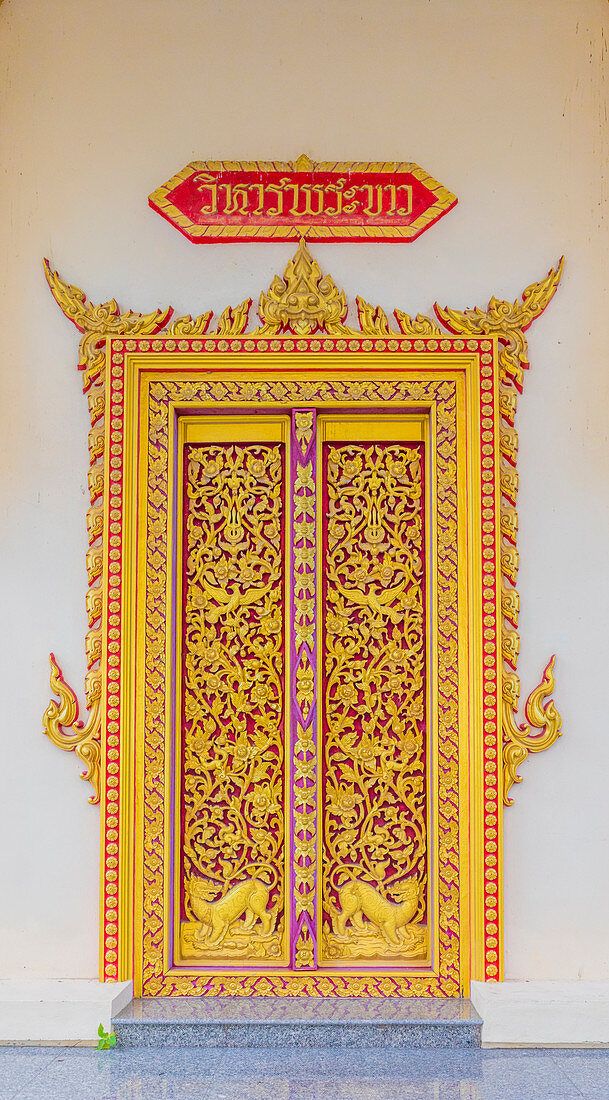 An ornate temple door at the Office of National Buddhism, in Phuket Town, Phuket, Thailand, Southeast Asia, Asia