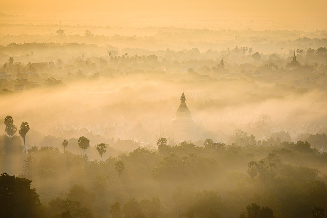 Aerial view of towers in misty landscape, Bagan, Myanmar