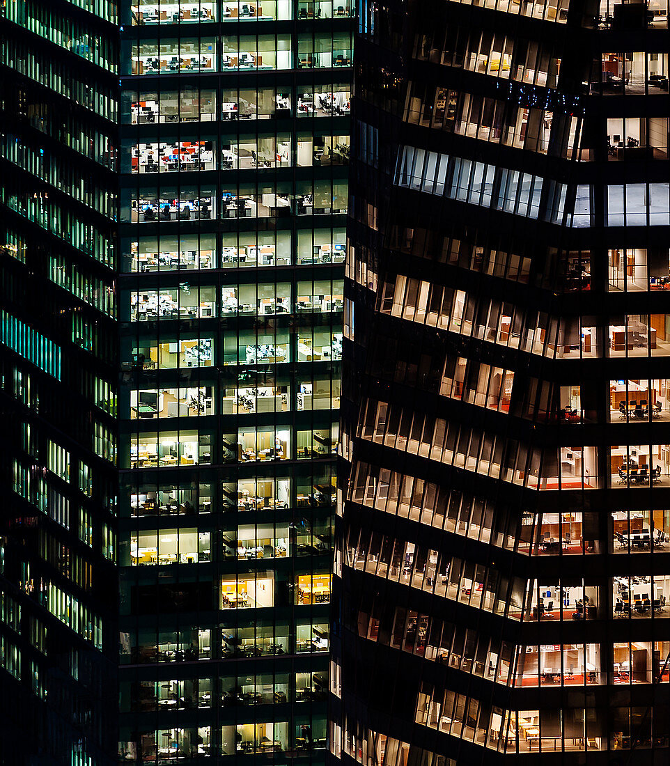 Illuminated highrise buildings at night, USA