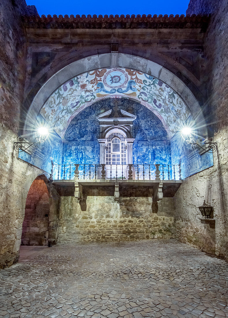 Church arch illuminated at night, Obidos, Leiria, Portugal