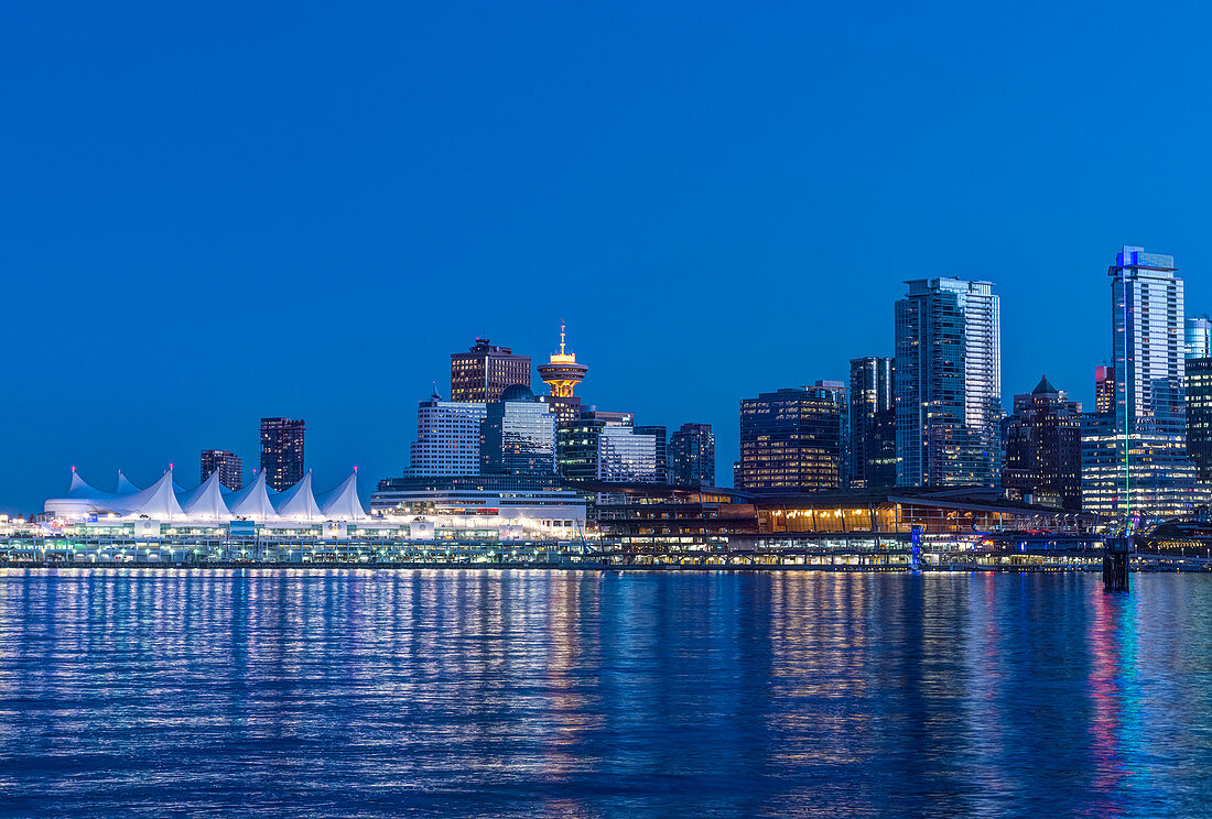 Waterfront skyline illuminated at night, Vancouver, British Columbia, Canada,
