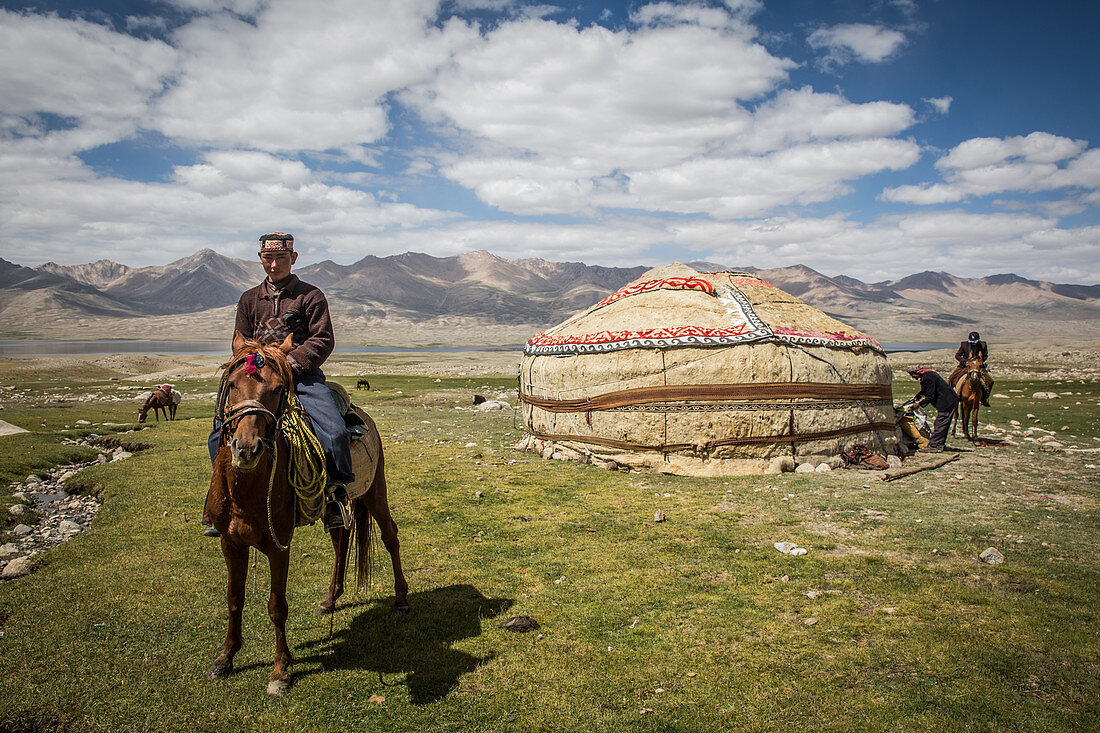 Kirgise on horse in front of yurt, Pamir, Afghanistan, Asia